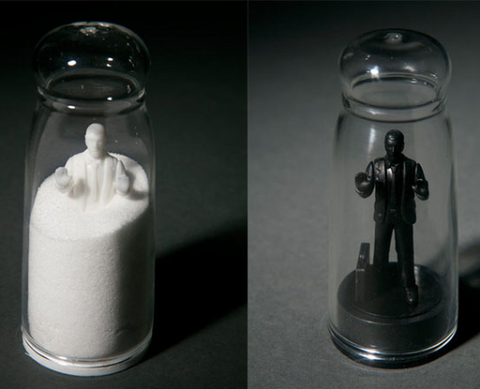 Kikkerland Drowning In Debt Salt & Pepper Shakers